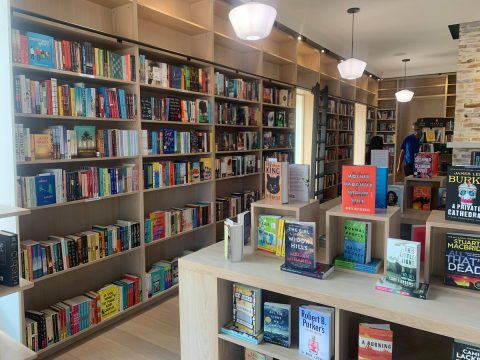 interior of River Bookshop showing tidy displays and shelves full of books