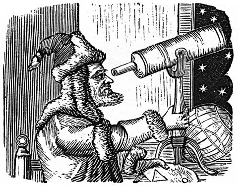 astronomer looking through telescope